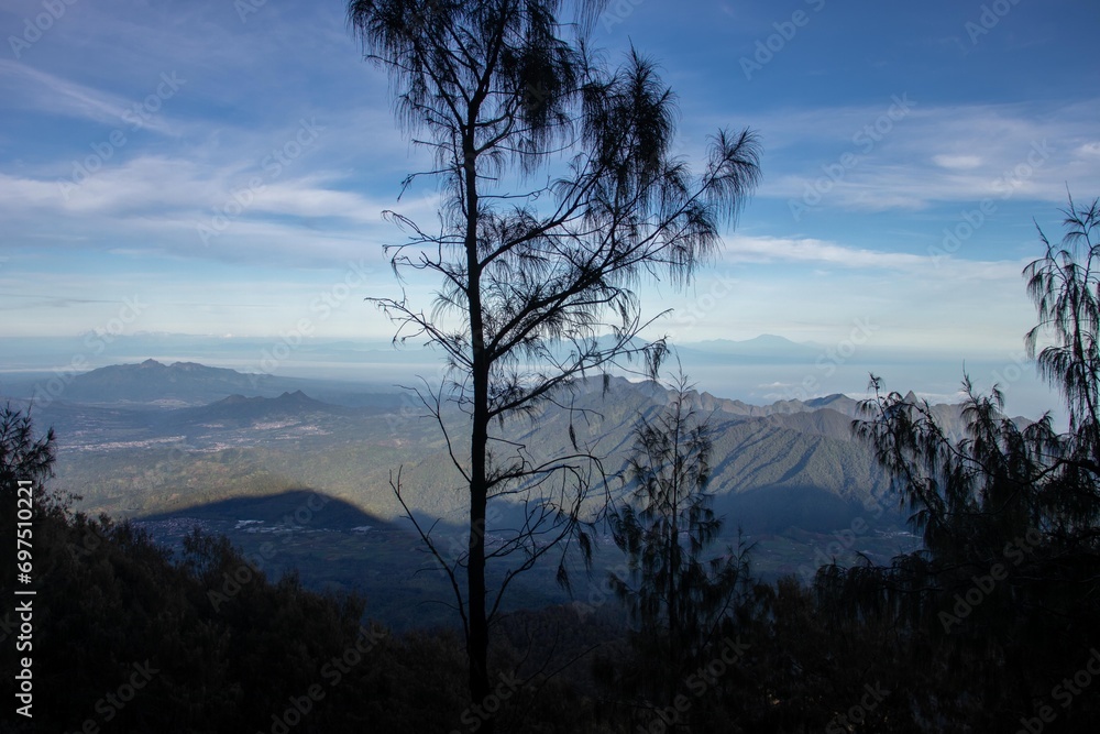 the beauty of the view at the top of a mountain in a tropical area is like a country above the clouds. a view presented when climbing an Indonesian mountain. the beauty of the view at the top of a mountain in a tropical area is like a country above the clouds. a view presented when climbing an Indonesian mountain.