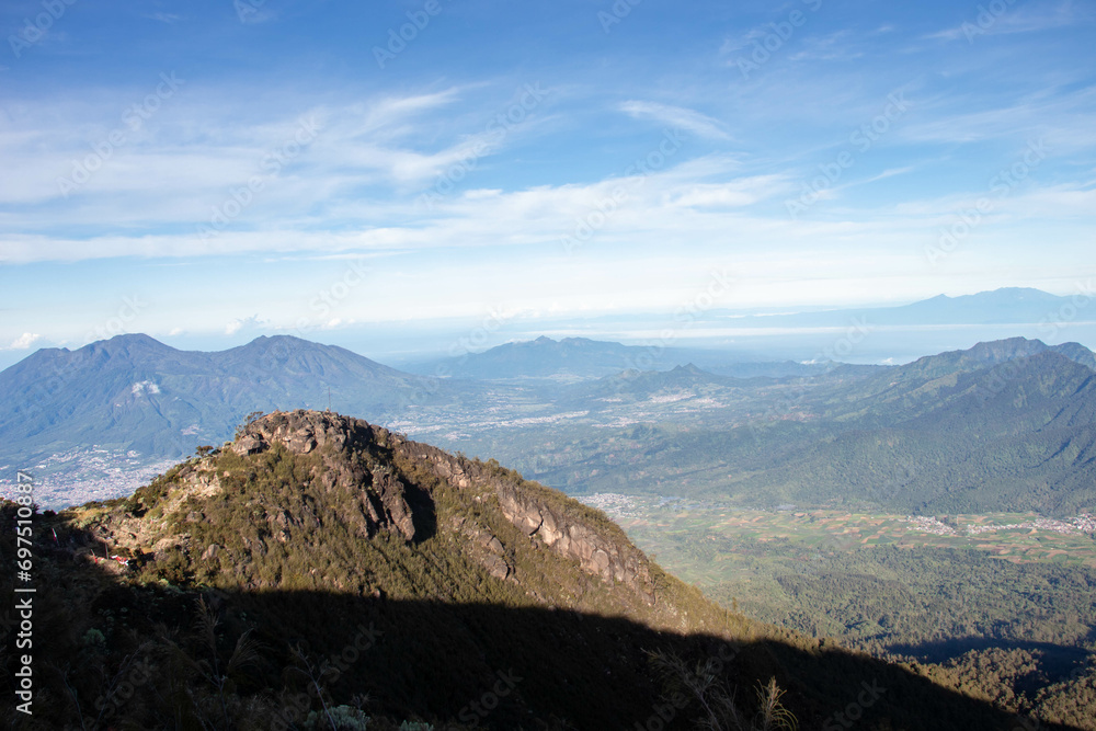 the beauty of the view at the top of a mountain in a tropical area is like a country above the clouds. a view presented when climbing an Indonesian mountain.