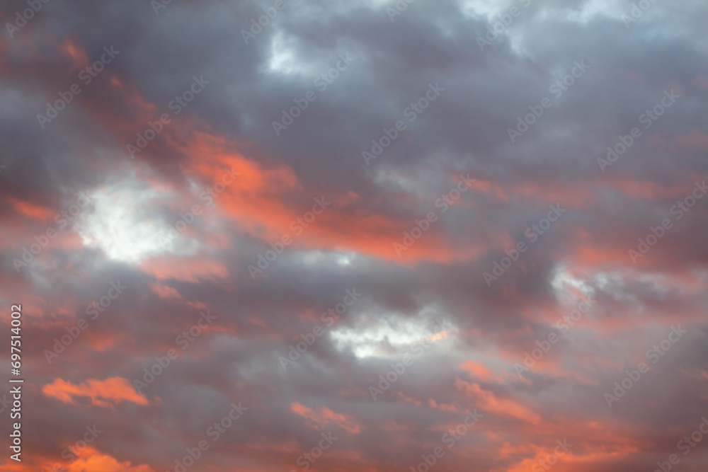 Fototapeta premium Colorful clouds at sunrise. Background