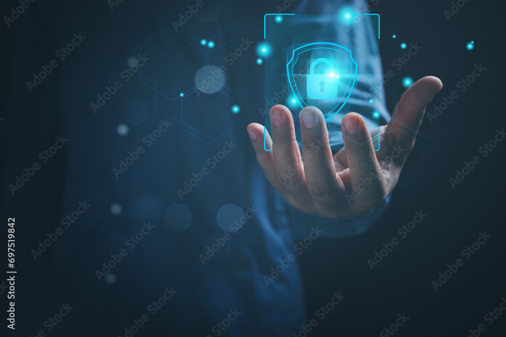 Cybersecurity, and privacy technology to the future concept. Businessman holding a lock on hand, protections personal data from attack cyber, and hacker. Technology cybersecurity. Cybersecurity, and privacy technology to the future concept. Businessman holding a lock on hand, protections personal data from attack cyber, and hacker. Technology cybersecurity.