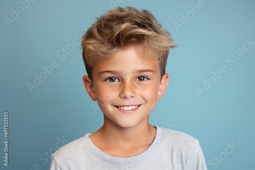 Caucasian smiling boy studio portrait, simple background. AI generative