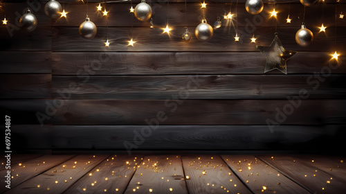 Christmas background with lights and baubles on dark wooden boards, festive festive backdrop photo
