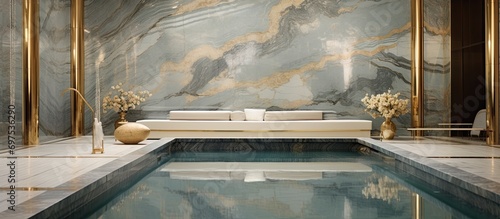 Luxury spa with swimming pool, marble and gold photo