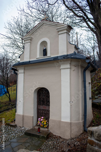 Old wayside shrine Stary Sacz, Poland. photo