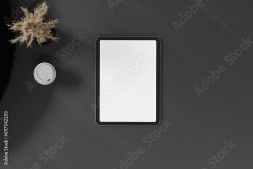 Blank tablet mockup on the black table (ID: 697542208)