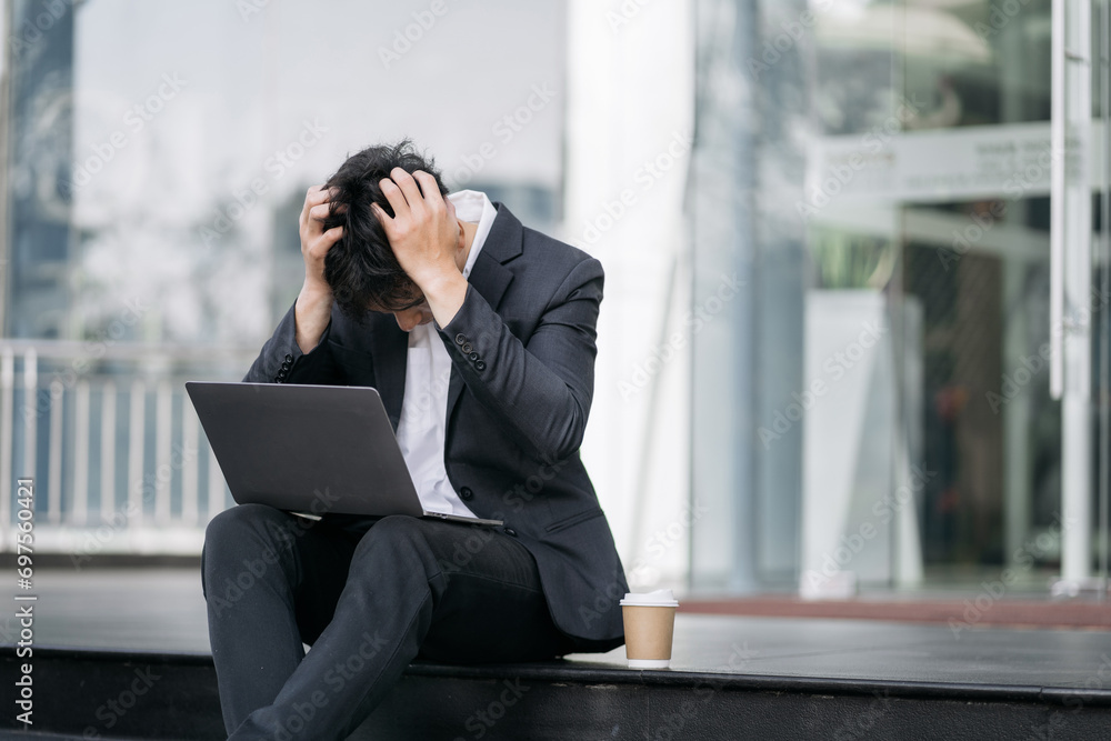 Concept of business failure and unemployment problem, unemployment stress businessman sitting on stairs. Concept of business failure and unemployment problem, unemployment stress businessman sitting on stairs.