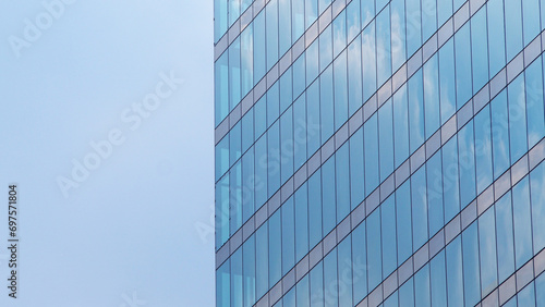 Abstract architecture background, minimalist top of building detail against blue sky for use as art, background or copyspace