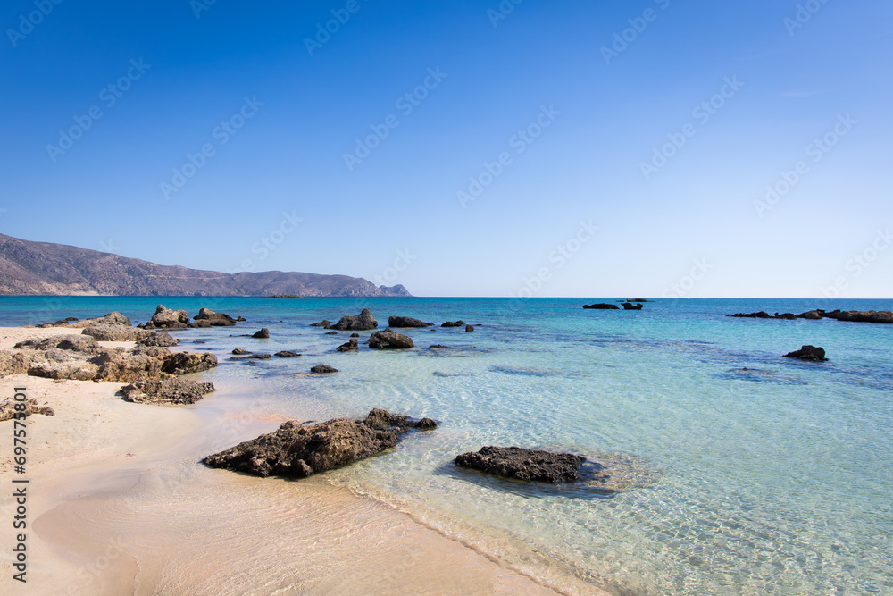 Elafonisi beach in Crete, Greece. Crystal clear sea water and blue sky.