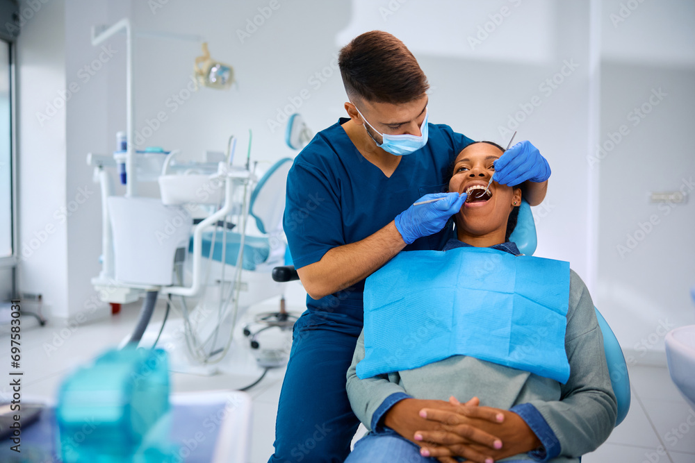 African American woman during dental appointment at dentist's office African American woman during dental appointment at dentist's office