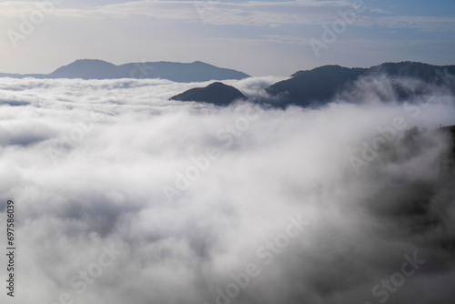 The fog rising in the valley early in the morning