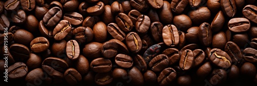 Close-up Top View of Dark Coffee Beans for Background, Perfect for Coffee Lovers and Cafe Marketing