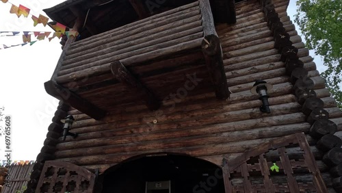 the entrance to a wooden fortress from Russian times, a small village, folk life, a fort, trade and military.