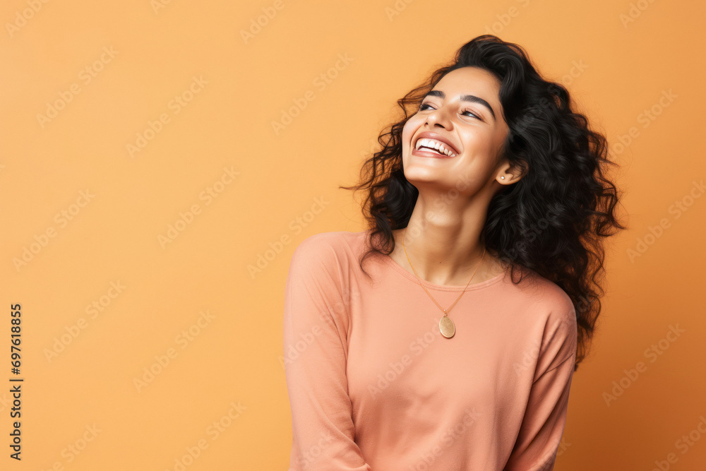 young and beautiful indian woman laughing young and beautiful indian woman laughing