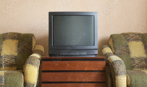 Konstfotografi Vintage TV on wooden antique closet, old design in a home