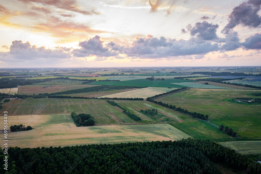 aerial panorama panorama view of landscape with fields t sunset
