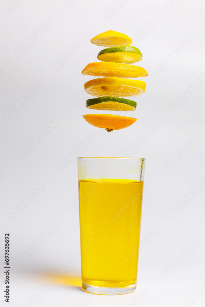 Lemon and lime cut into rings for making juice, levitation of lemon and lime Lemon and lime cut into rings for making juice, levitation of lemon and lime
