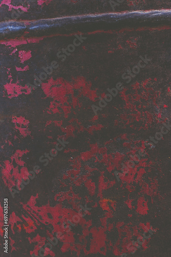 Metal texture with peeled red paint