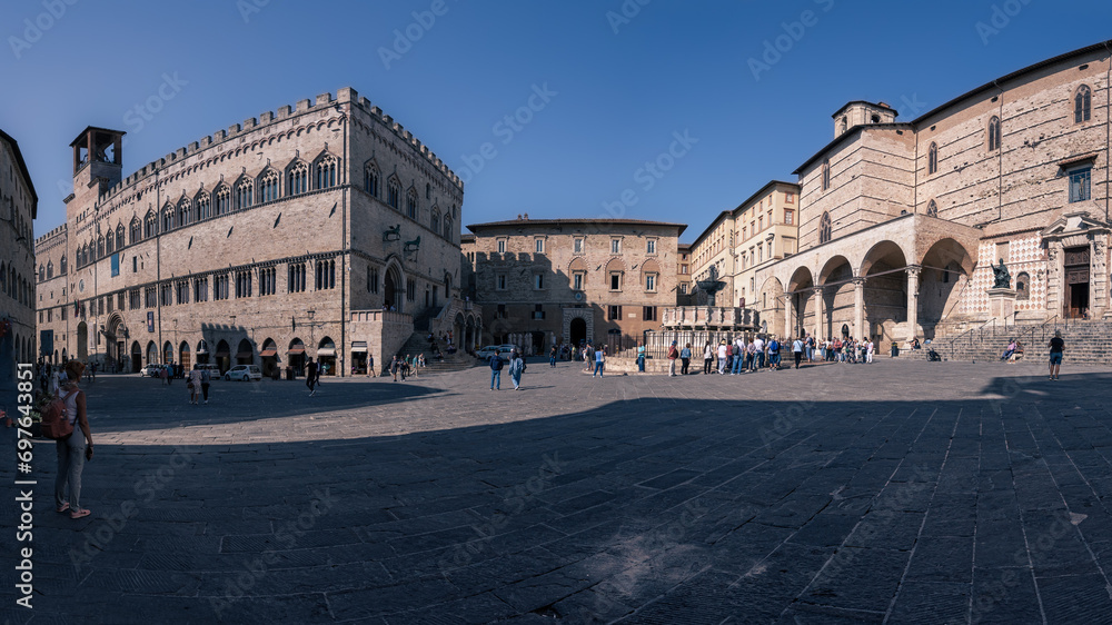 Piazza IV Novembre ancient square with fountain and medieval buildings at sunny day, Perugia, Italy