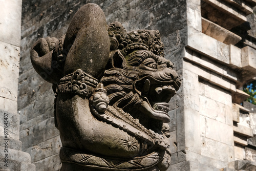 Demon at the entrance to the Uluwatu Temple. Bali, Indonesia. photo