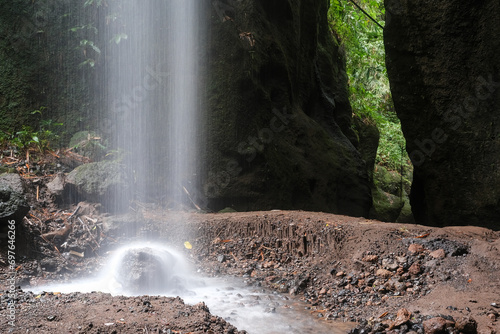 Long exposure shot of one of Krisik waterfalls. Bali, Indonesia.