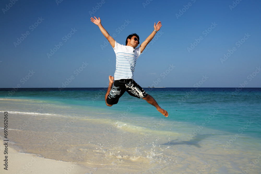 Jumping into the paradise in Maldives Jumping into the paradise in Maldives