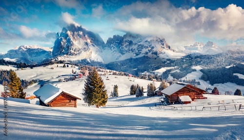 gorgeous morning view of alpe di siusi village stunning winter landscape of dolomite alps majestic outdoor scene of ski resort ityaly europe beauty of nature concept background photo