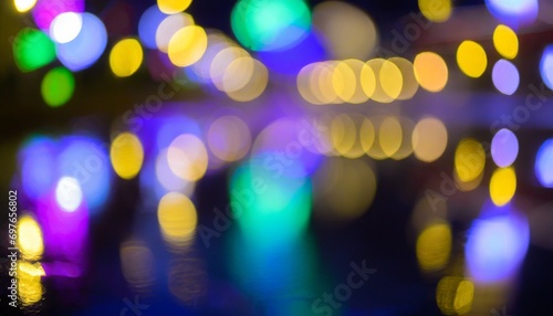 multi colored neon lights on a dark city street reflection of neon light in puddles and water abstract night background blurred bokeh light night view colorful © Ashley