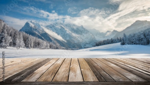 wooden floor and snowy landscape with abstract blurred winter mountains generative ai © Ashley