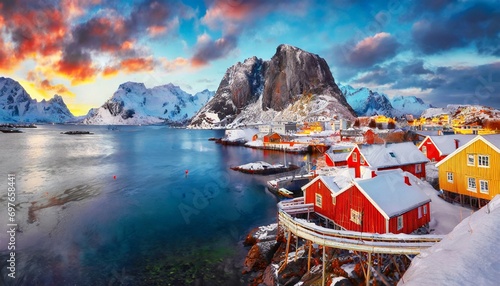 fantastic evening cityscape of nusfjord town norway europe great sunset on lofoten island archipelago fabulous winter seascape of norwegian sea life over polar circle photo