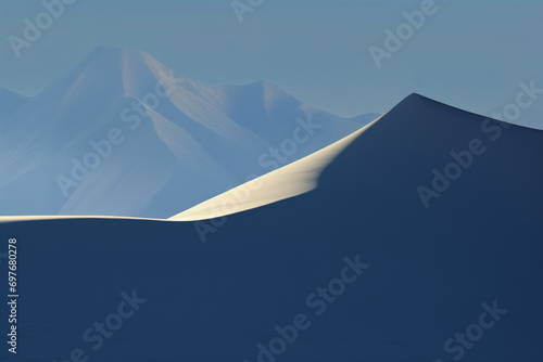 Solitary peak in high mountains in delicate morning sunlight