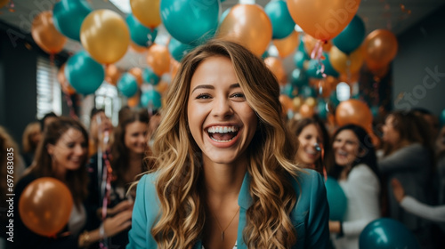 A girl smiling and raising hands up with happy mood and fun with office team celebrating an event with colorful balloons everywhere   photo
