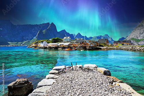 Beautiful sunrise over Hamnoy, fishermen village with the typical red houses of the Lofoten Islands, Norway
 photo
