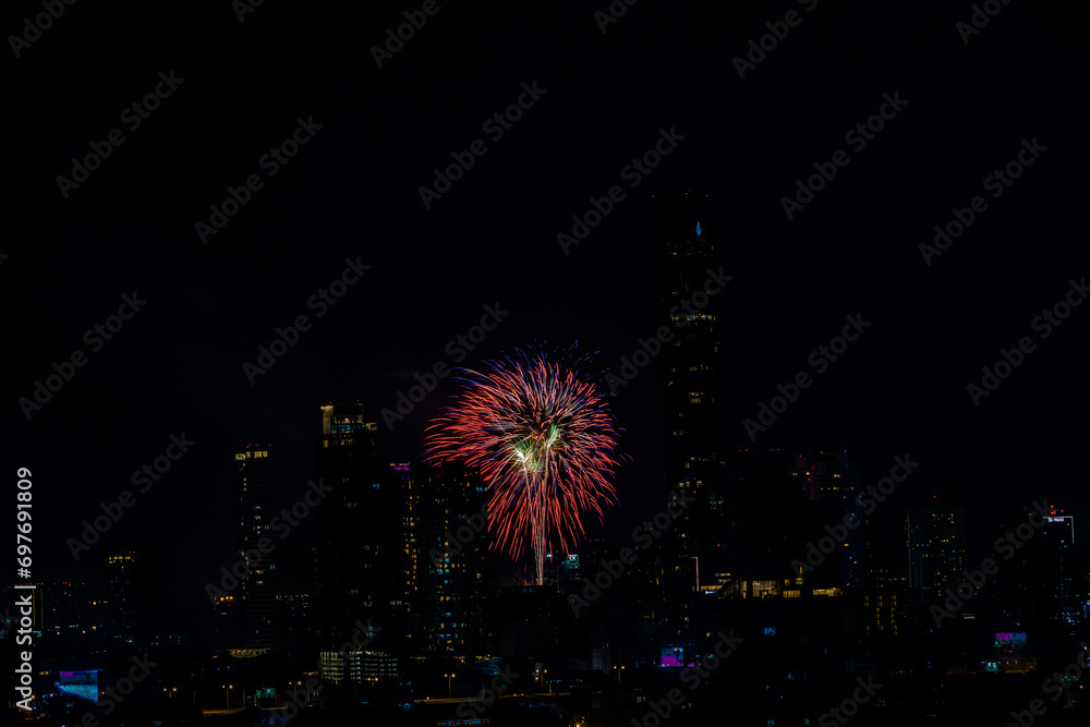 The blurred background of fireworks (light trails) is beautiful at night, seen in the New Year holidays, Christmas events, for tourists to take pictures during public travel.