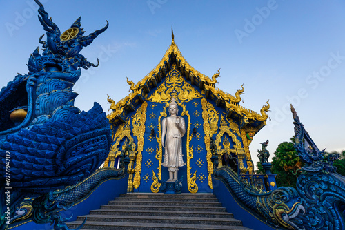 Background Chiang Rai Blue Temple or Wat Rong Seua Ten is located in Rong Suea Ten in the district of Rimkok a few kilometers outside Chiang Rai,Thailand photo