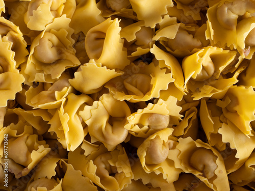 Tortellini di Valeggio Sul Mincio uncooked fresh pasta background photo