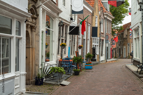 Street in the center of the medieval harbor town of Zierikzee in the province of Zeeland in the Netherlands. photo