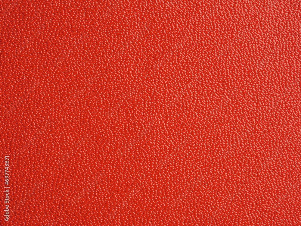 Leather surface of the material with a red color on bags and clothes Leather surface of the material with a red color on bags and clothes