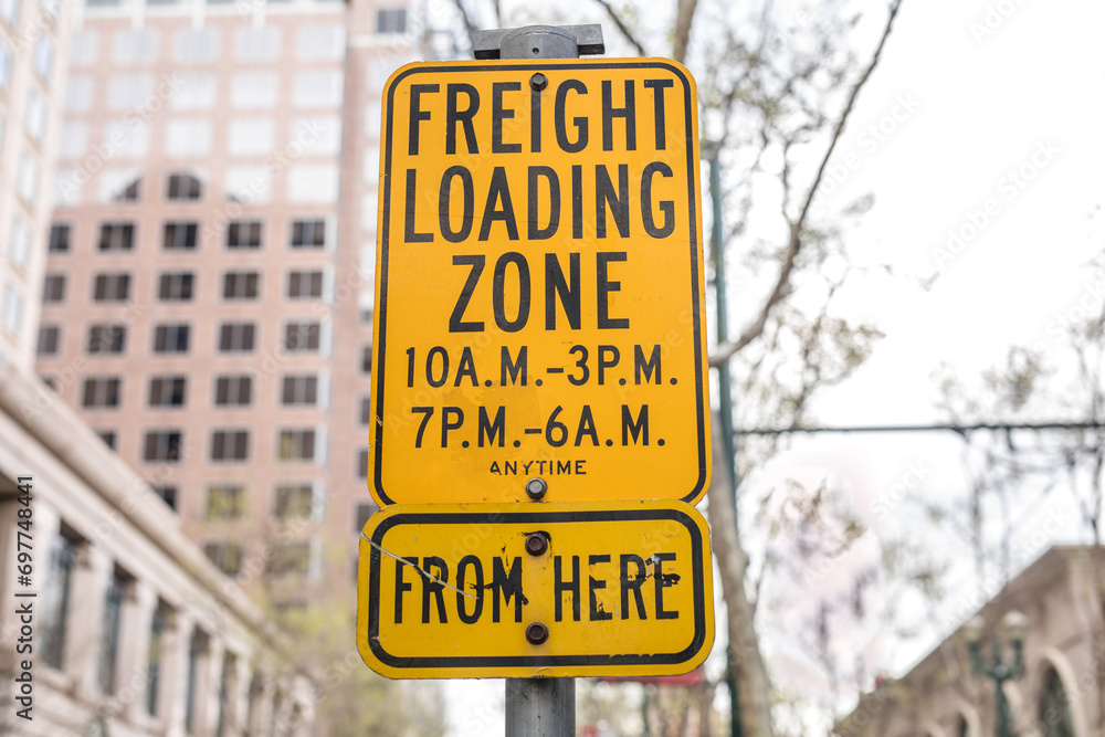 Freight loading zone from here yellow sign
Freight loading zone from here yellow sign