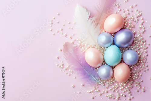 Easter card with mother of pearl eggs with feathers and pearl beads on a light background, top view copy space for text