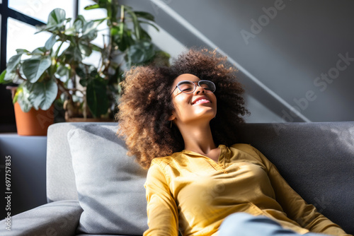 Joyful African American Lady Embracing Leisure on Sofa
