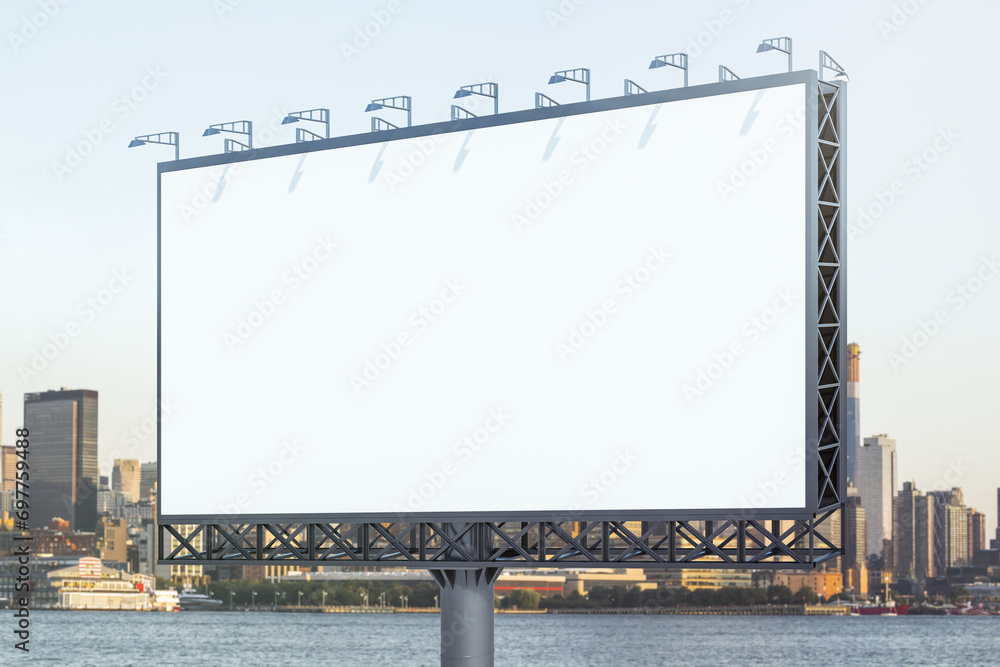 Blank white billboard on city buildings background at daytime, perspective view. Mockup, advertising concept Blank white billboard on city buildings background at daytime, perspective view. Mockup, advertising concept