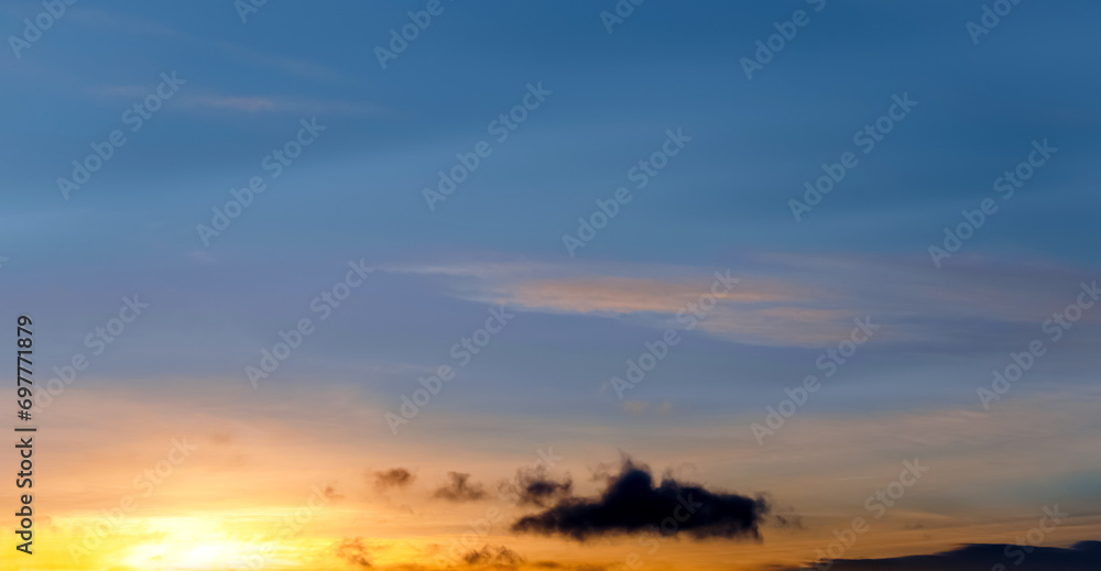 Sunset Sky Background,Beautiful Morning Sunrise with colorful Yellow, Orange ,Blue and Cloud on Spring,Nature Panoramic Landscape Golden hour or Romantic Summer Sky