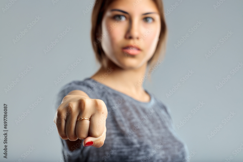 Empowerment spoken through focused fist gesture Empowerment spoken through focused fist gesture