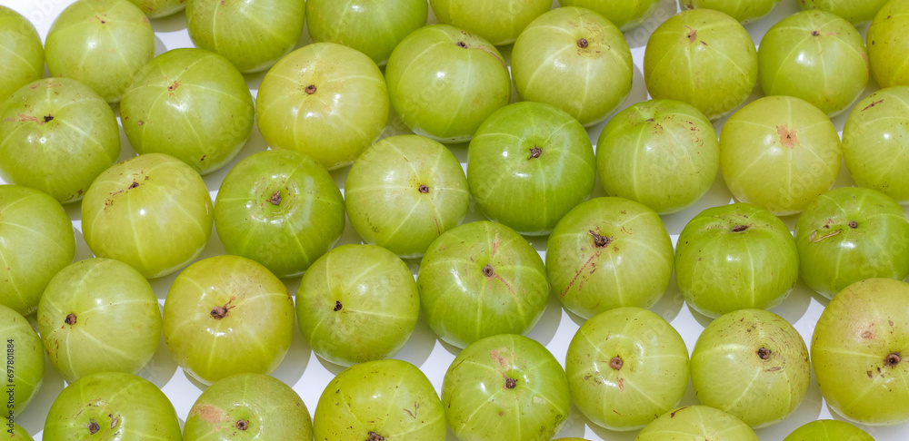 Fresh Gooseberries - Amla Indian gooseberry background Fresh Gooseberries - Amla Indian gooseberry background