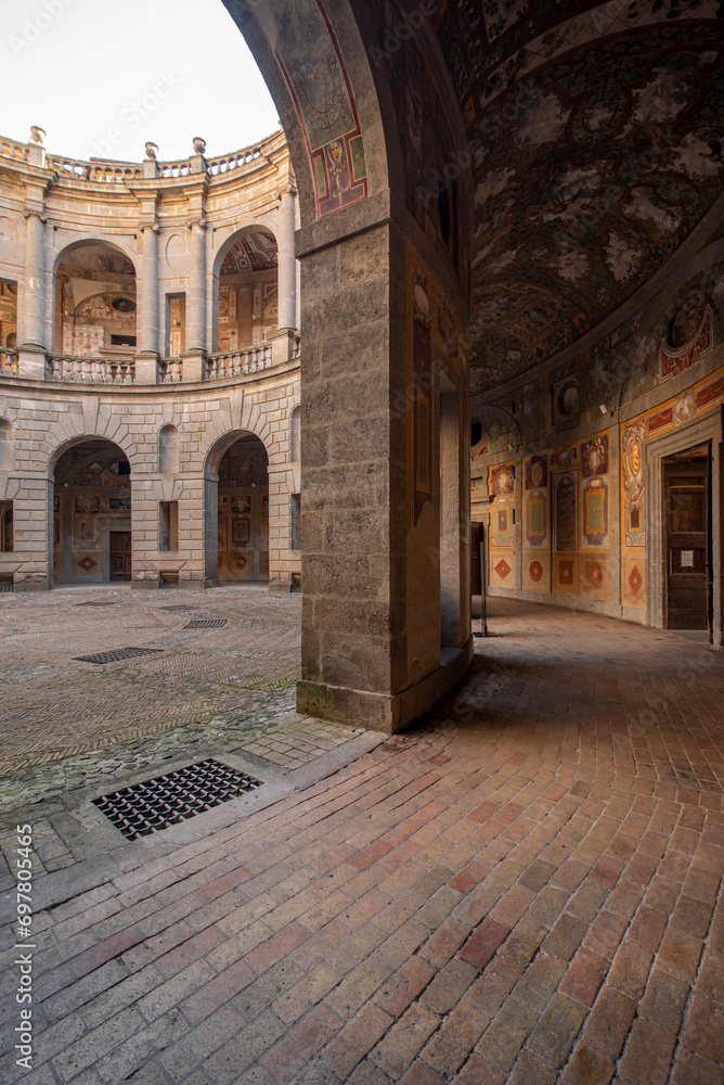 Caprarola, Viterbo, Italy - 2023, September 12: Palazzo Farnese, the internal circular colonnaded courtyard.