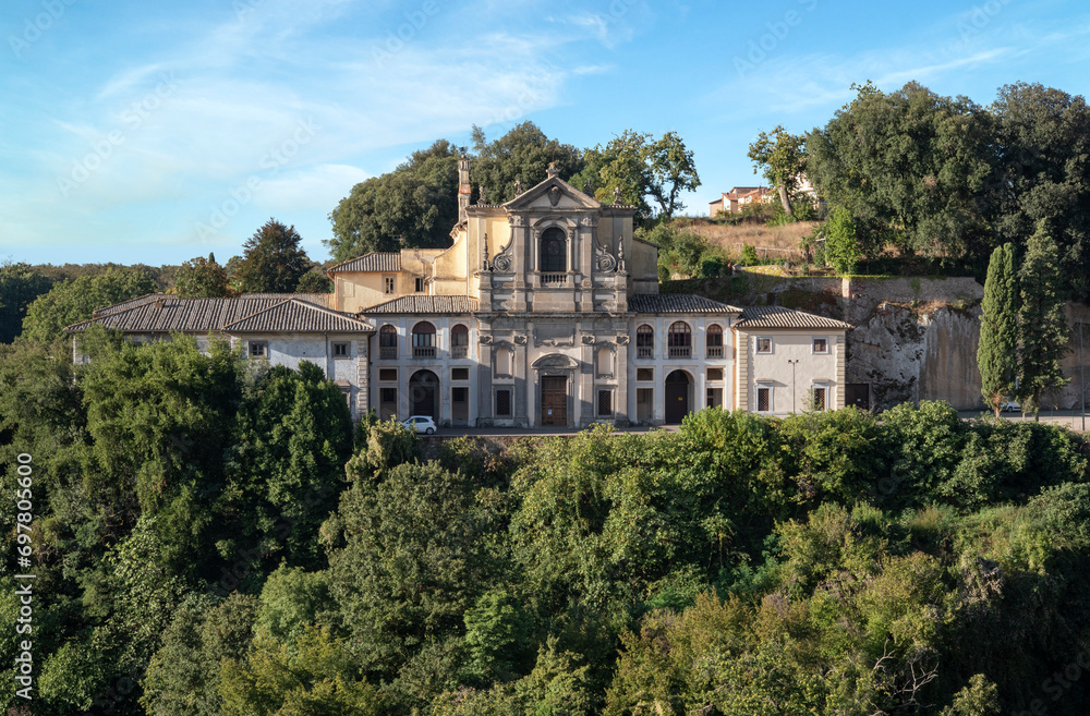 Caprarola, Viterbo, Italy - 2023, September 12: Santa Teresa a Caprarola church, in front of the facade of the Farnese Palace.