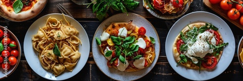 Full table of italian meals on plates Pizza, pasta, ravioli