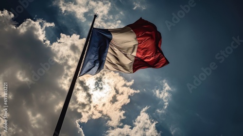 Flag of France. French tricolor against a blue sky.