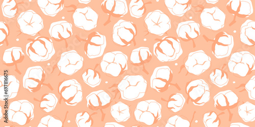 Seamless pattern with abstract cotton bolls. Soft delicate print in trendy peach shades. Vector graphics.