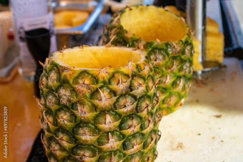 Two hollowed out pineapples ready for coctails